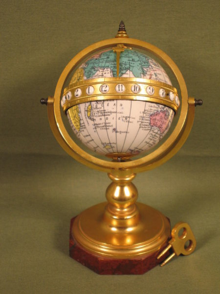 Enamelled globe clock
