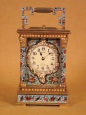Threequarter size champleve enamel striking carriage clock