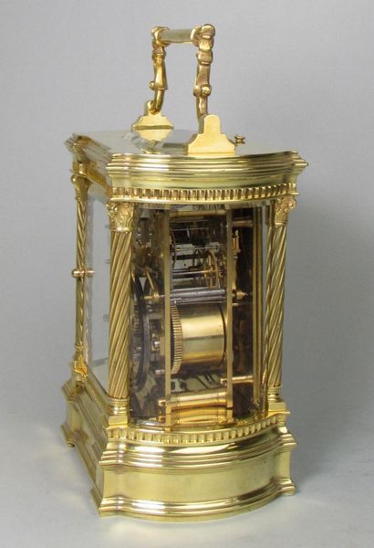Bowed side French carriage clock with black dial