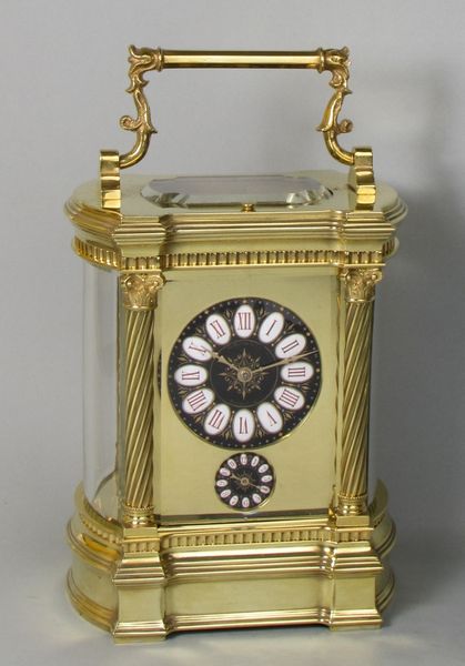 Bowed side French carriage clock with black dial
