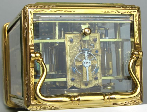 Early carriage clock with unusual escapement.