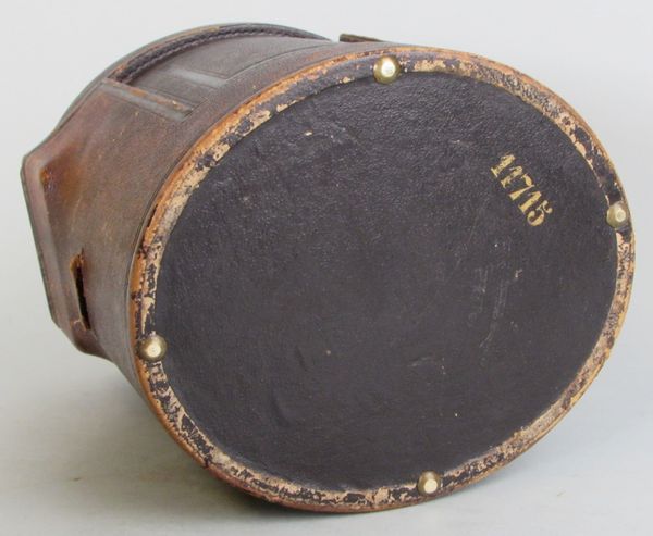 An engraved oval carriage clock