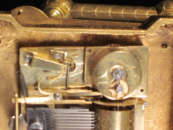 Rare fully engraved early musical carriage clock with day, date and alarm