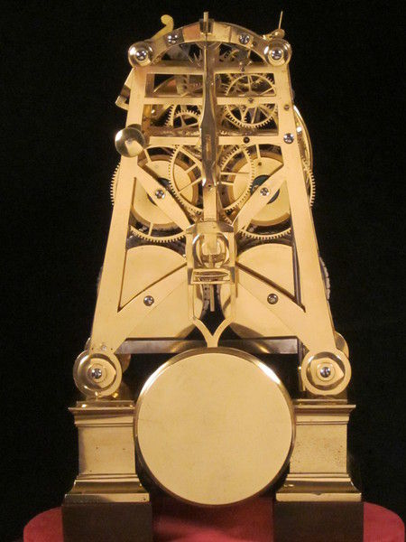 early ( circa !832) English skeleton clock with strikework in the base.