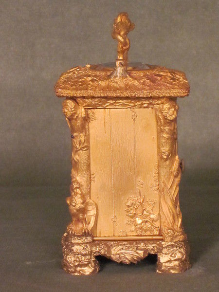 Unique? miniature carriage clock in the form of a country cottage.