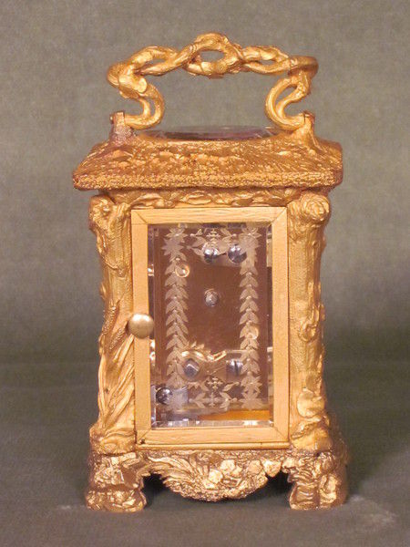 Unique? miniature carriage clock in the form of a country cottage.