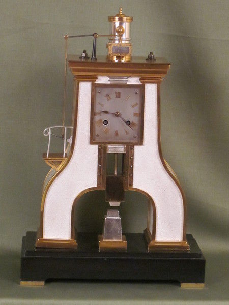 Guilmet clock based on the steam hammer