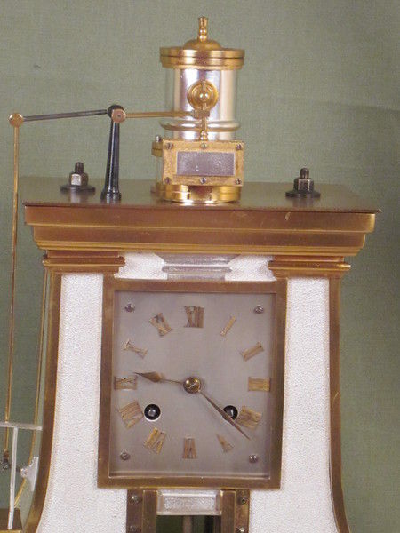 Guilmet clock based on the steam hammer