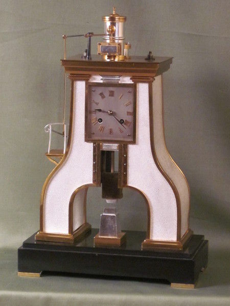 Guilmet clock based on the steam hammer