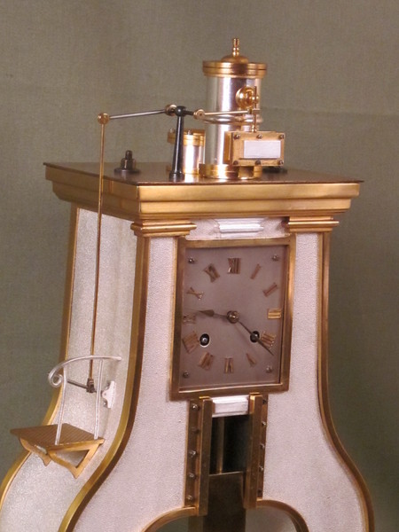 Guilmet clock based on the steam hammer