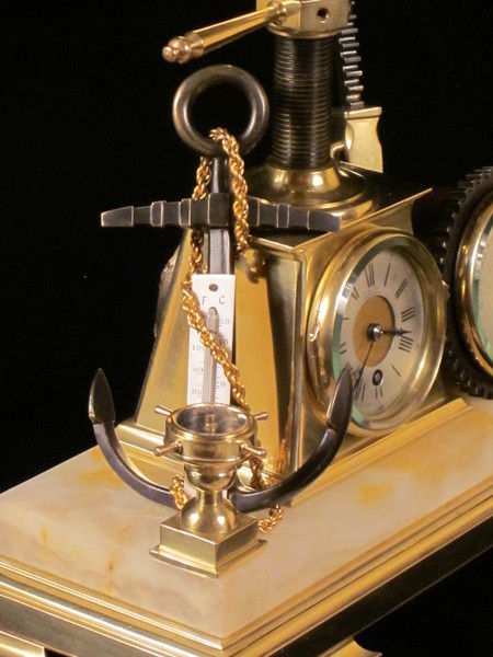 Maritime industrial clock with globe, anchor, etc.
