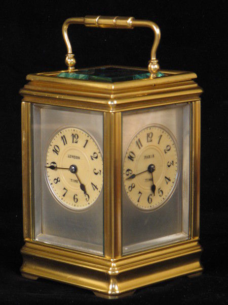 clock with dials on four sides indicating time in London,Paris, New York