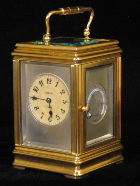 clock with dials on four sides indicating time in London,Paris, New York