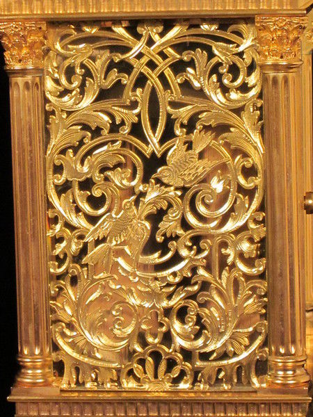 Petite sonnerie carriage clock with fretted out, engraved and gilded panels