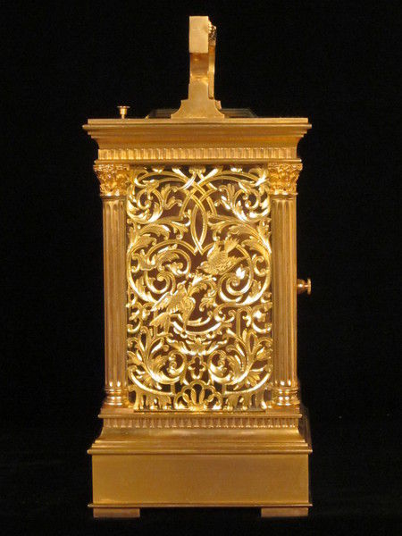 Petite sonnerie carriage clock with fretted out, engraved and gilded panels