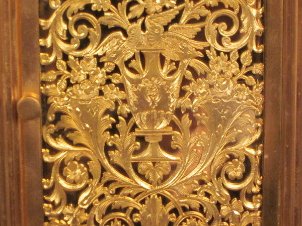 Petite sonnerie carriage clock with fretted out, engraved and gilded panels