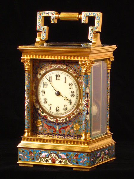 A fairly large champleve enamel carriage gong striking carriage clock