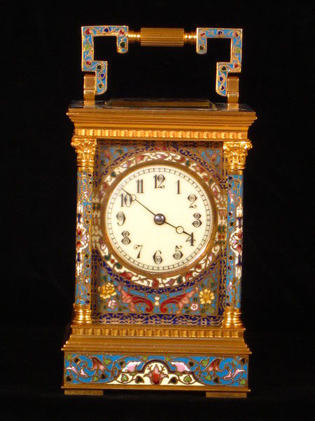 A fairly large champleve enamel carriage gong striking carriage clock