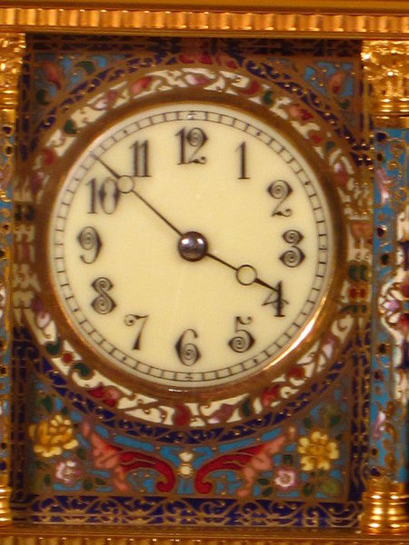 A fairly large champleve enamel carriage gong striking carriage clock