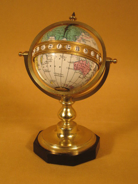 Redier rotating enamelled globe clock indicating time world-wide. circa 1880