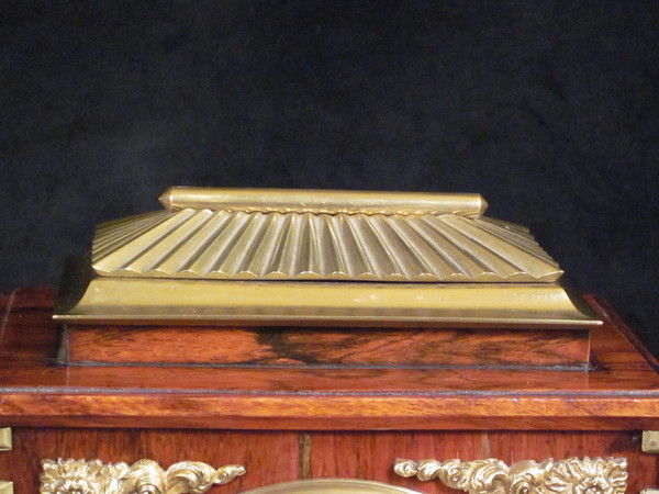 small rosewood bell striking clock with concealed handle by Alabone,1840..  