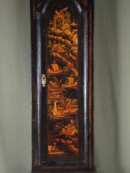 fine green lacquer longcase showing high water and phases of the moon.