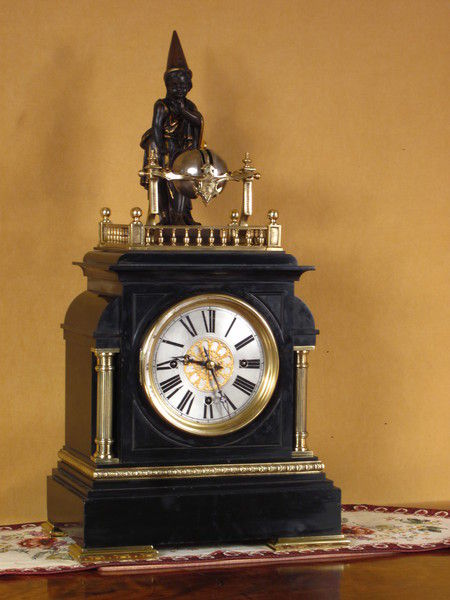 rare automaton clock with wizard striking the quarters on four bells
