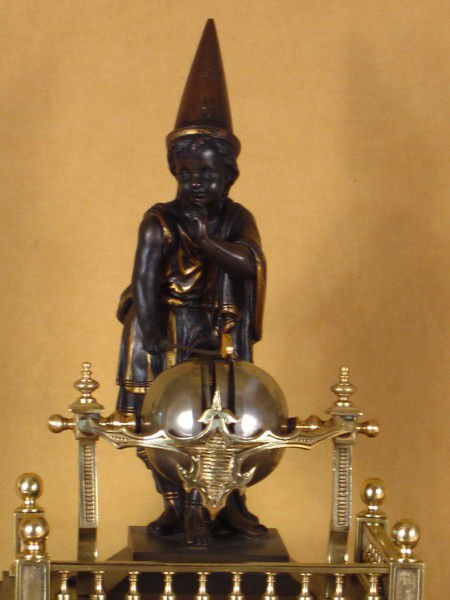 rare automaton clock with wizard striking the quarters on four bells