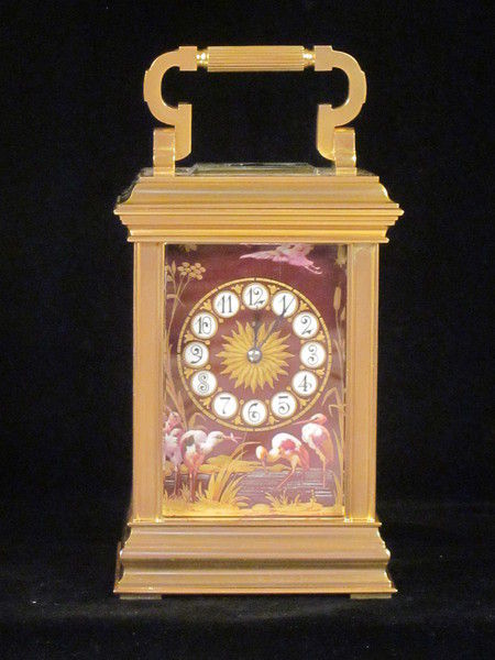 S/R. carriage clock with box and fine porcelain panels with Herons nr lake.