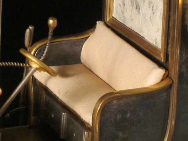 A rare automaton car clock by Guilmet, 