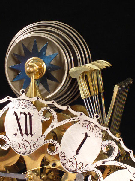 8 bell skeleton clock playing Whittington chimes at the quarters.