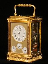 fully engraved Grande sonnerie gorge carriage clock with calendar work