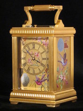 export market petite sonnerie carriage clock with birds on porcelain panels