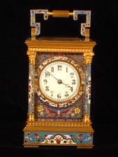 A fairly large champleve enamel carriage gong striking carriage clock