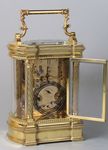 Bowed side French carriage clock with black dial (France)