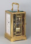 Early carriage clock with unusual escapement. (France)