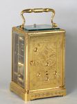 Early carriage clock with unusual escapement. (France)