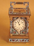 Threequarter size champleve enamel striking carriage clock (France)