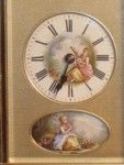 rare strike and repeat carriage clock with oval porcelain panels.  (France)