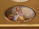 rare strike and repeat carriage clock with oval porcelain panels.  (France)