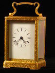 Early engraved carriage clock by Auguste (France)