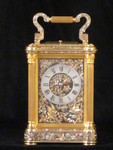 A exceptionally fine carriage clock in muti-coloured relief work (France)