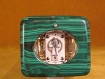 A French carriage clock almost completely covered with solid malachite (France)