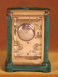 A French carriage clock almost completely covered with solid malachite (France)