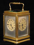 clock with dials on four sides indicating time in London,Paris, New York (France)