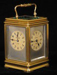clock with dials on four sides indicating time in London,Paris, New York (France)