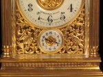 Petite sonnerie carriage clock with fretted out, engraved and gilded panels (France)