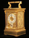 Petite sonnerie carriage clock with fretted out, engraved and gilded panels (France)