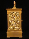 Petite sonnerie carriage clock with fretted out, engraved and gilded panels (France)