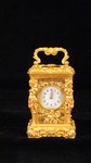 Miniature carriage clock with carytids, engraved panels and original case.   (France)